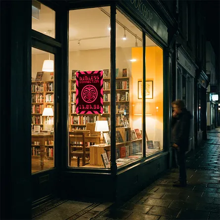 fluorescent pink day glo poster in shop window