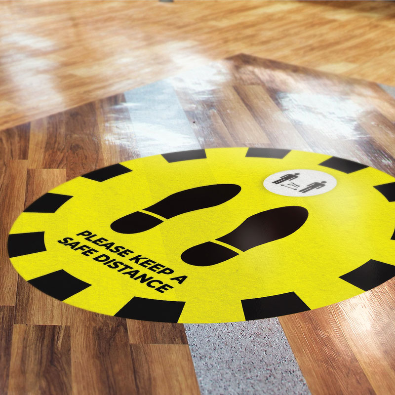 Keep safe distance floor graphic with foot prints Keep safe distance floor graphic with foot prints