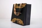 bolsa negra dorado