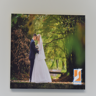 Photographic paper affixed on stiff material